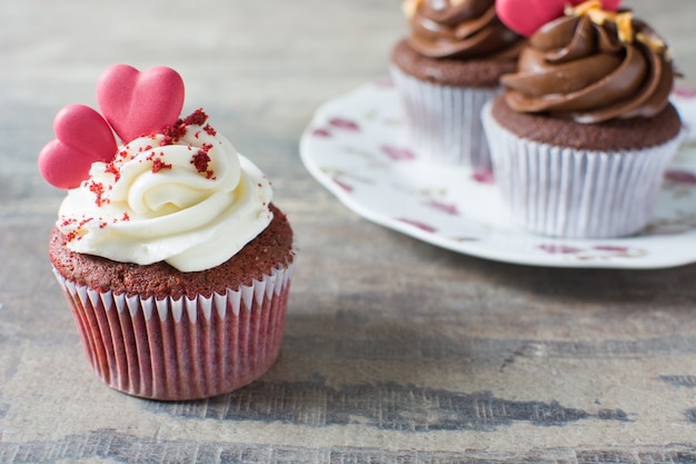 Valentine cupcake on wooden table