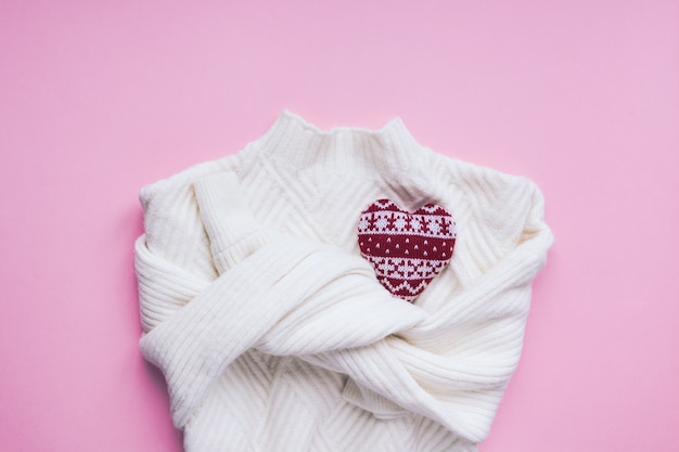 Valentine day composition with white sweater