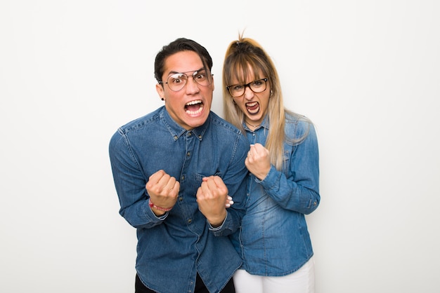 In valentine day young couple with glasses frustrated by a bad\
situation