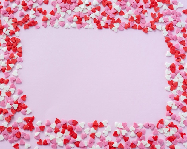 Valentine frame made from little red, white and pink sugar hearts