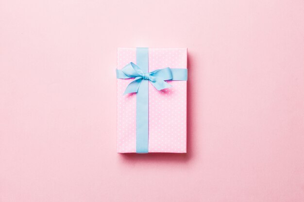 Valentine gift box on colored , top view