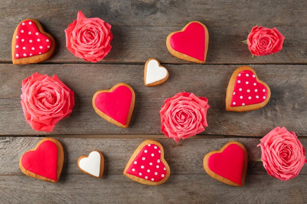 Valentine heart cookies on wooden background