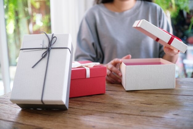 Valentine present. Gift box and red ribbon for romantic couple.