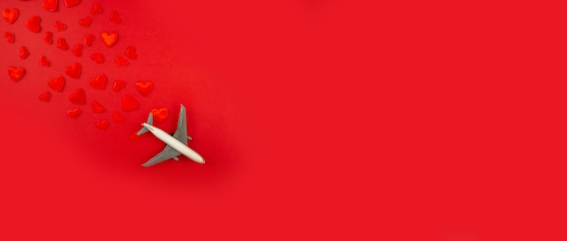 Valentine's card, beautiful red background with airplanes. Selective focus. Love.