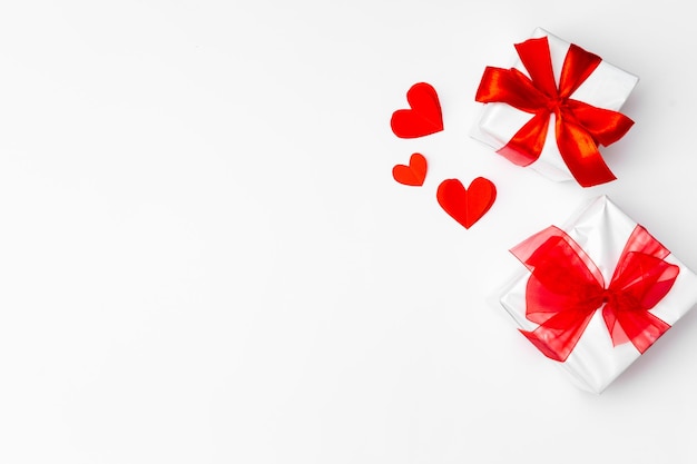 Valentine's Day background. Gifts, hears on white. Concept of love and affection. Holiday card.