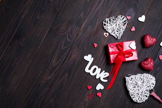 Premium Photo | Valentine's day background with love letters and heart shapes. Premium Photo | Valentine's day background with love letters and heart shapes.