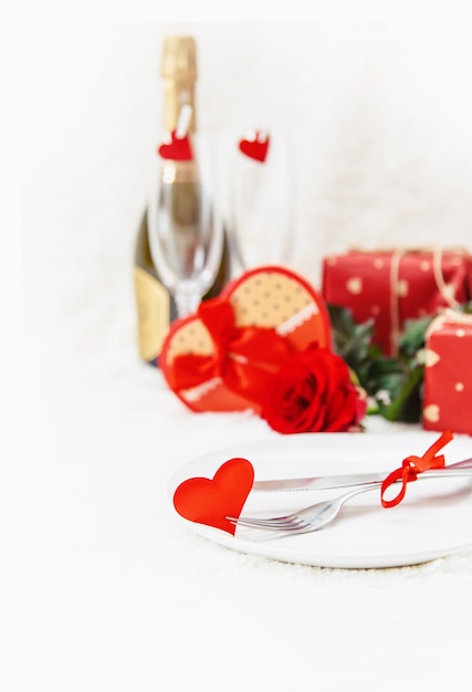 Valentine's Day. Beautiful background greeting card with a rose. Selective focus.