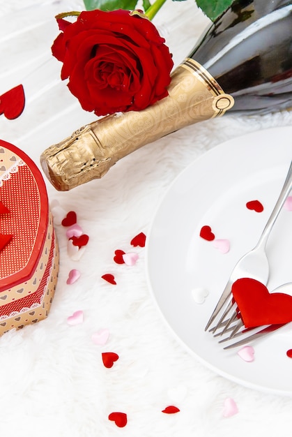 Valentine's Day. Beautiful background greeting card with a rose. Selective focus.