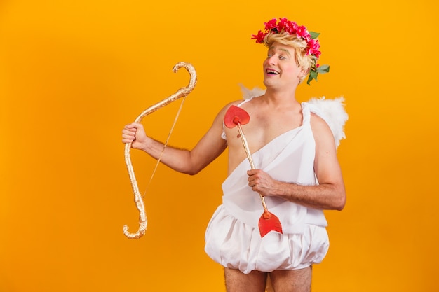 Valentine\'s day concept. portrait of the god of love - cupid\
with bow and arrow.