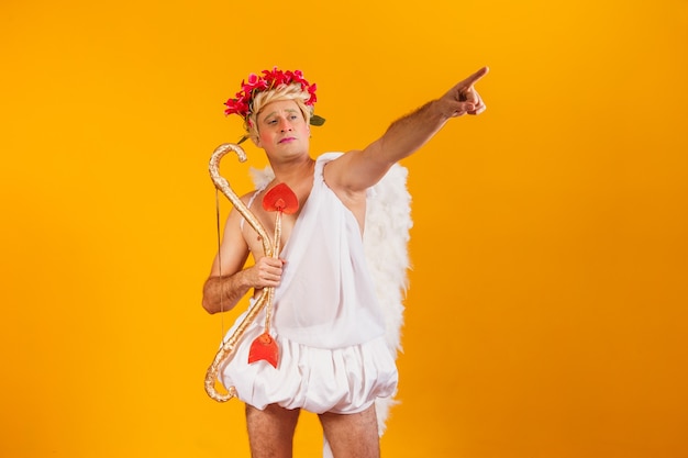 Valentine\'s day concept. portrait of the god of love - cupid\
with bow and arrow.