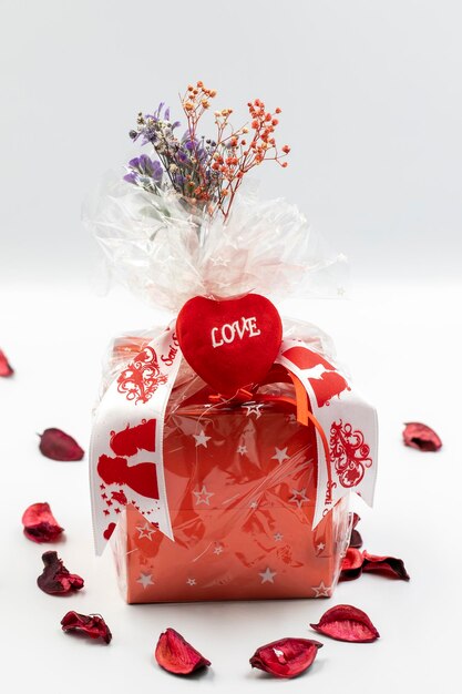 Valentine's day gift filled with chocolate on a white background