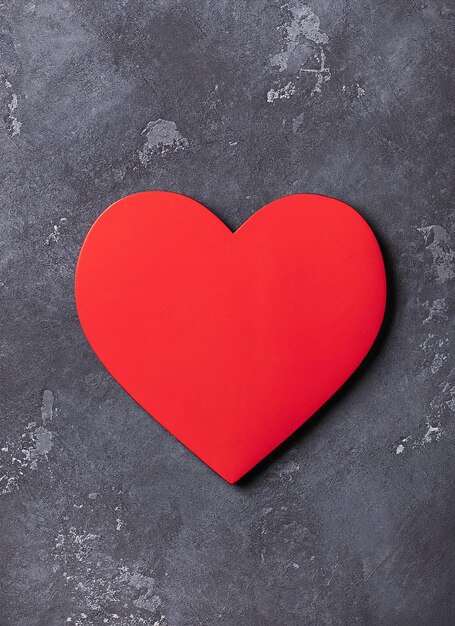 Photo valentine's day heart on a dark cement background copy space for text
