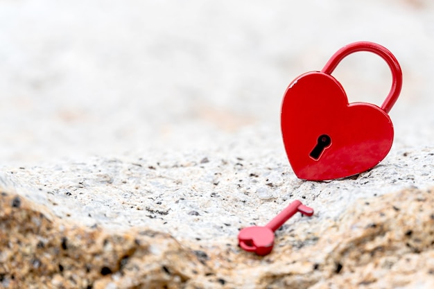 Valentine's Day and love concept with heart shaped padlock. Sweetest key and romance symbol.