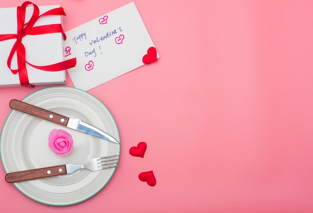 Photo valentine's day package on a pink background