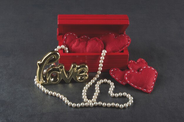 Photo valentineâs day background with red box and red hearts.