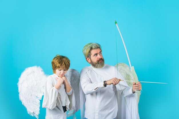 Valentines angels cute angel gorgeous kid happy father in angel costume with little son angel father