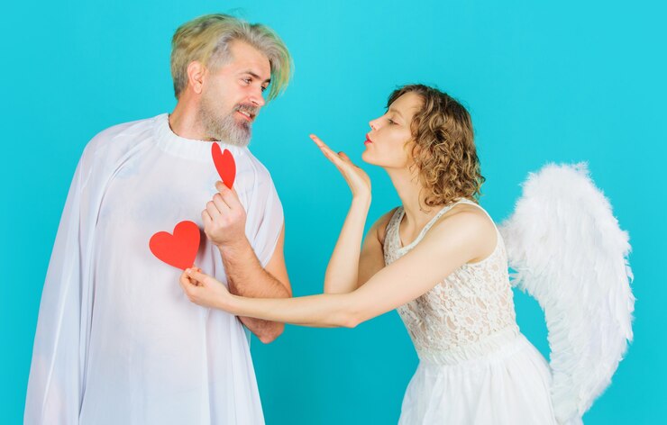 Photo valentines day. angel with red hearts.