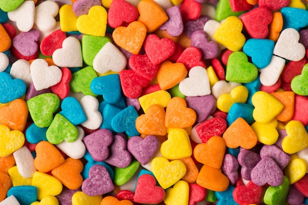 Valentines day background concept. Top above close up view photo of cute little lot of multicolored hearts