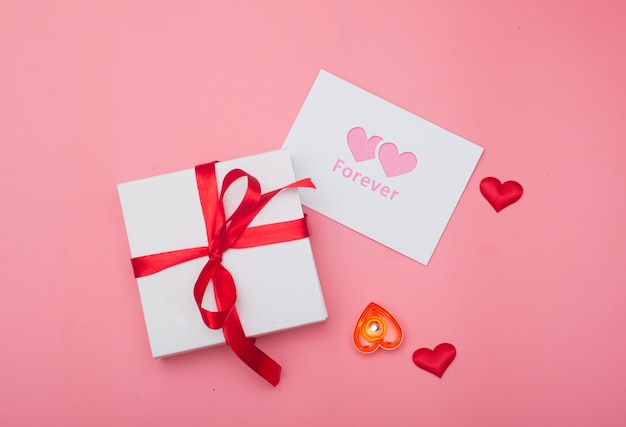 Valentines day background, Valentines day card and gift box on pink background