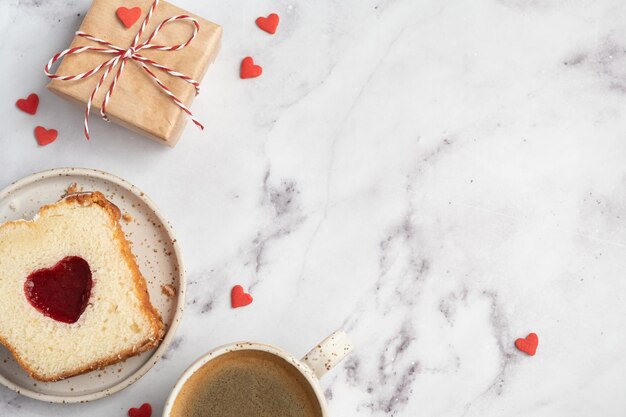 Valentines day breakfast with heart cake and coffee