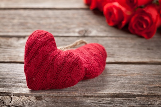 Valentines day card with red roses and hearts