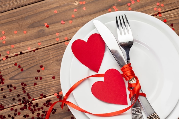 Valentines day composition on wooden table