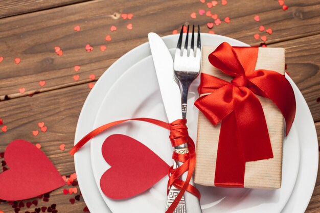 Valentines day composition on wooden table