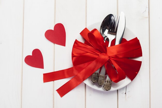 Valentines day composition on wooden table