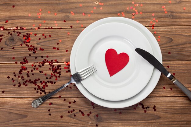 Valentines day composition on wooden table