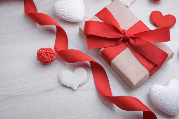 Valentines day concept.Red gift ribbons, gifts, hearts