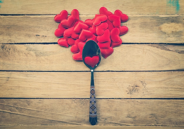 Valentines day dinner with table setting in rustic wood for Vintage style.