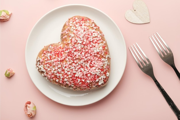 Valentines day food heart shaped cake and two forks