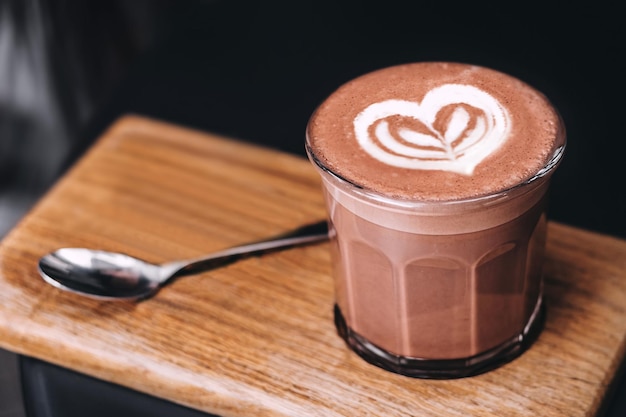 Valentines day hot cocoa drink with heart shaped pattern