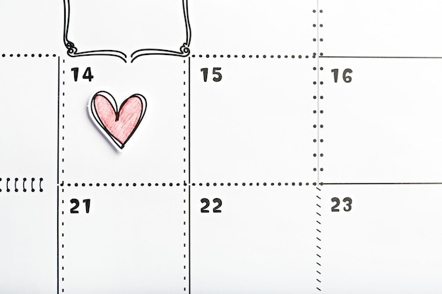 Valentines day marked with red heart in the calendar