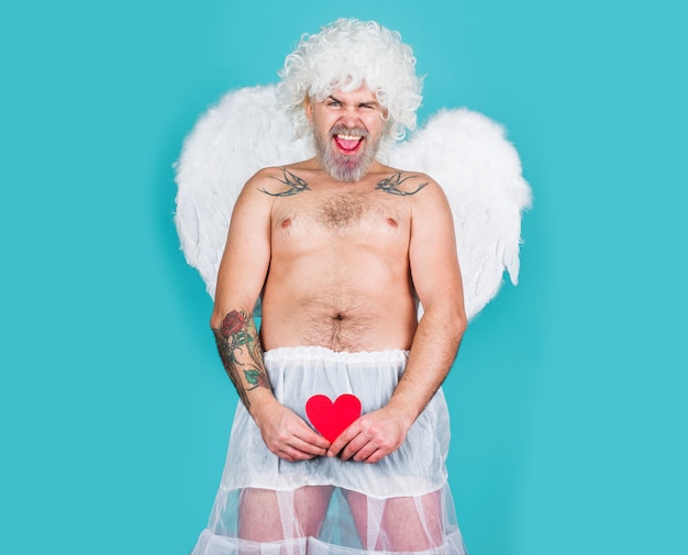 Valentines day. Naughty cupid. Bad cupid. Bearded angel. Paper heart Sex