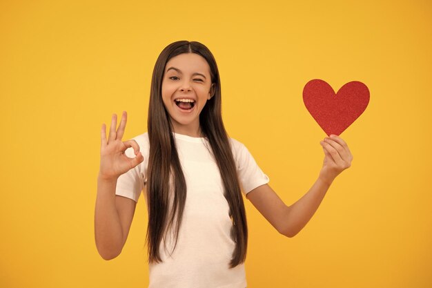 Valentines sale portrait of child with heart happy valentines day