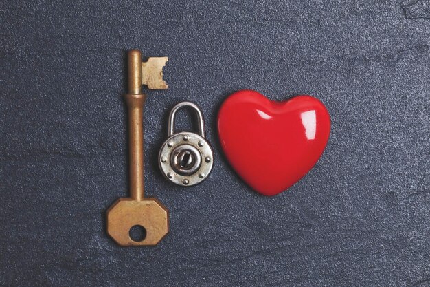 Valentines unlock love concept Red heart with padlock and key