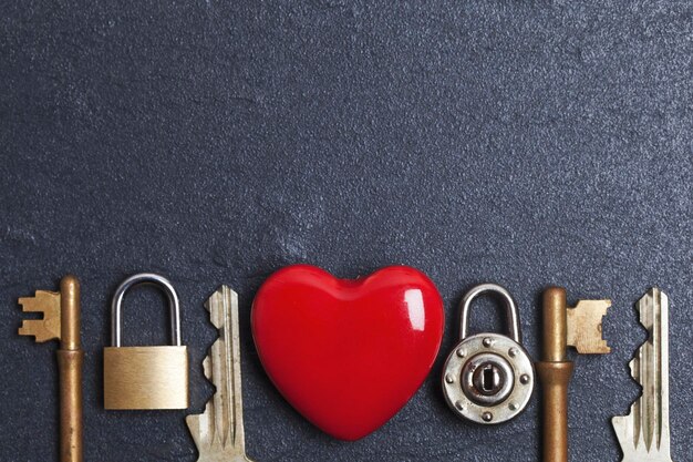 Valentines unlock love concept Red heart with padlock and key