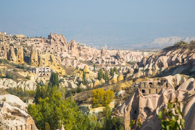 Valley of doves panoramic view near Uchisar castle in sunrise, Cappadocia, Turkey