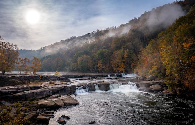 Valley Falls State Park near Fairmont in West Virginia on a colorful misty autumn day with fall colors on the trees