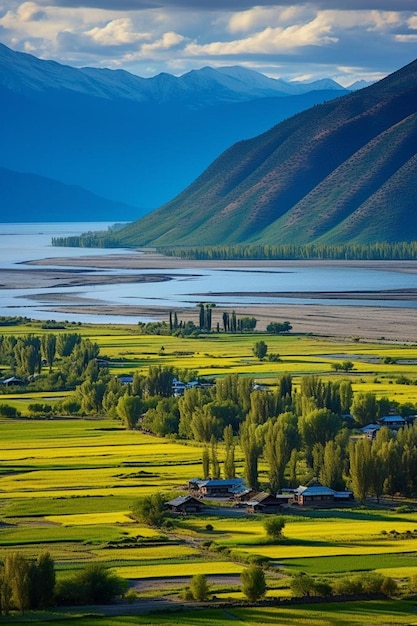 Photo a valley with a lake and mountains in the background