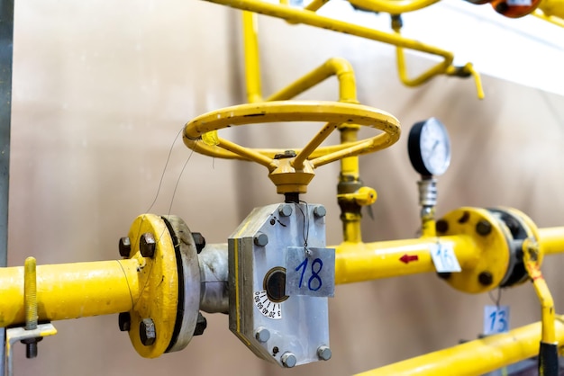 The valve of the heating system in closeup in the boiler room