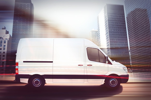 Van moving fast on a city road