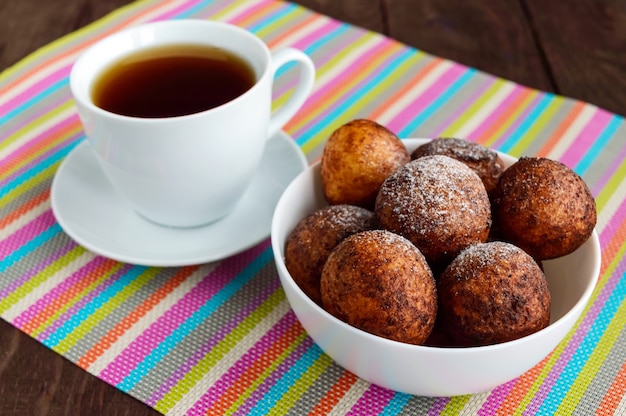 Vanilla cheese balls, deep fried and a cup of tea. lovely breakfast.