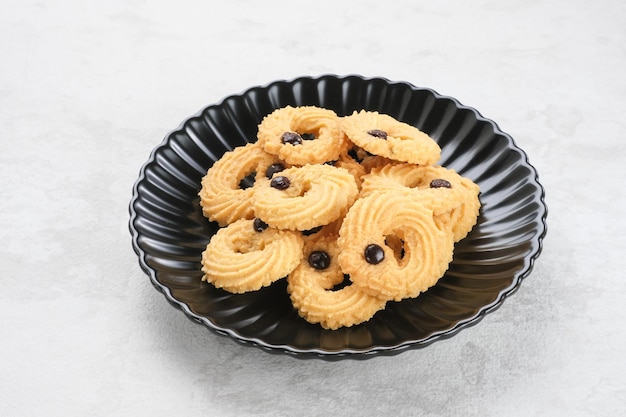 Vanillechips Koekjes geserveerd op zwarte plaat kopieerruimte Populair om Eid al Fitr te vieren