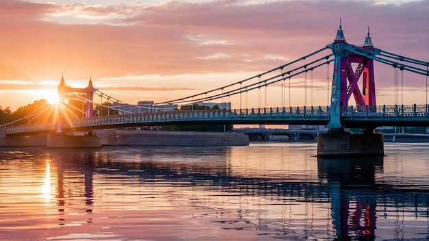 Photo vansu bridge over the daugava river during the sunset in riga latvia