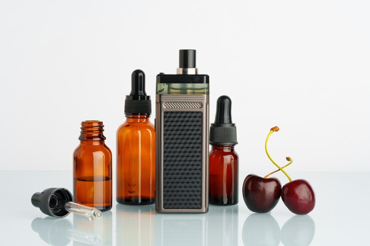 Photo vape liquid with cherry flavor on white background