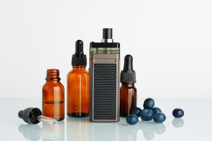 Photo vape smoking liquid with berry flavor close up