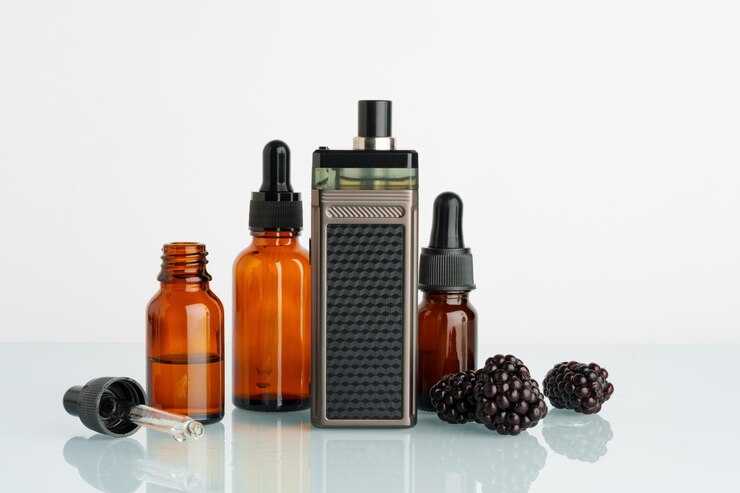 Photo vape smoking liquid with berry flavor close up
