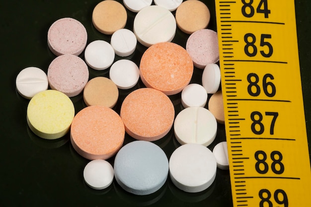 Variation of coated tablets for treatment of diseases